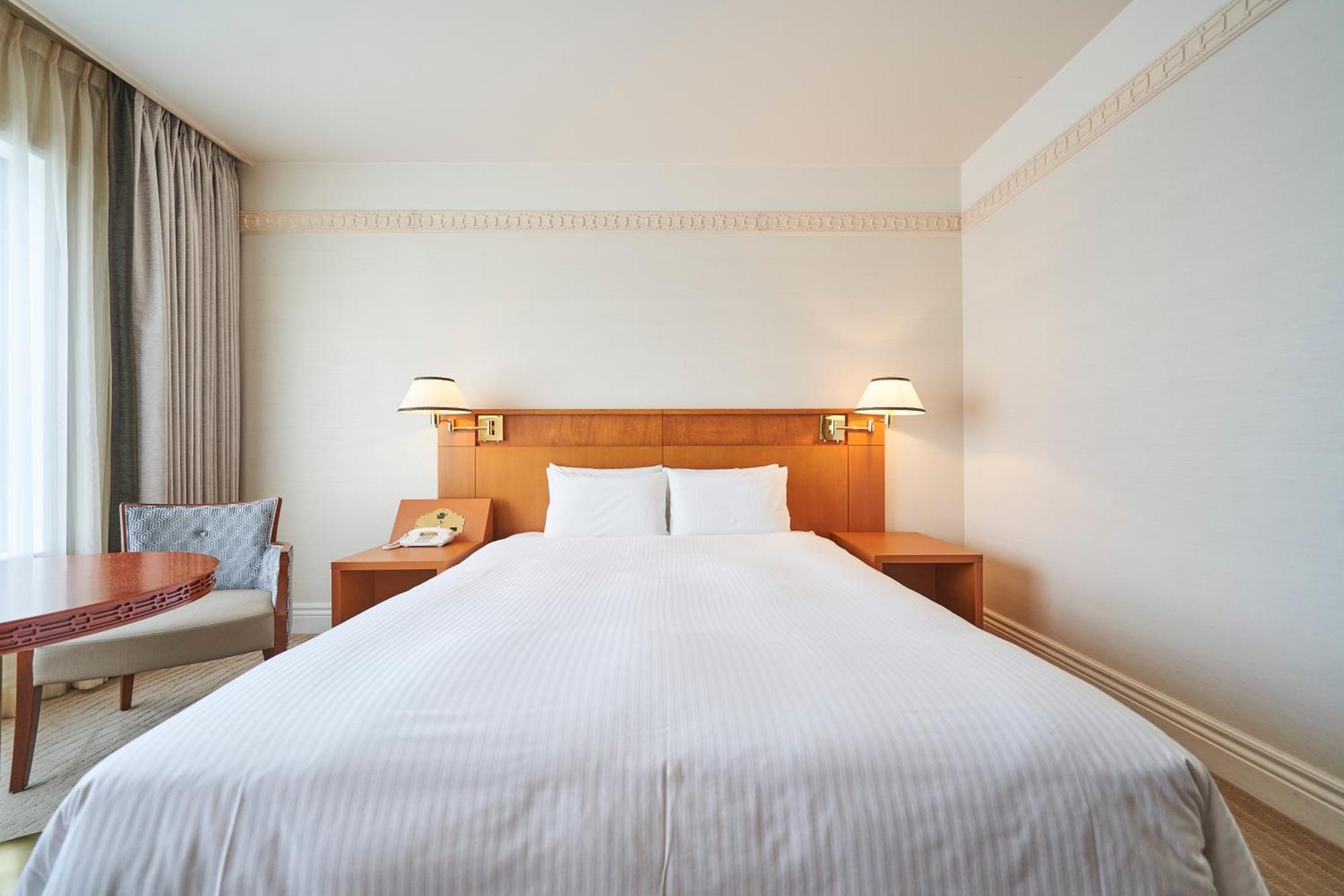 The Global View Nagasaki Hotel Exterior photo A bed